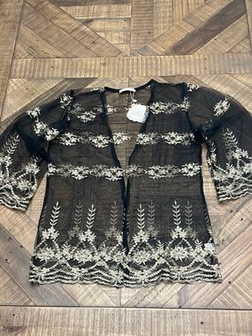 sheer black cardigan from Simply Couture-feminine, vintage-inspired design